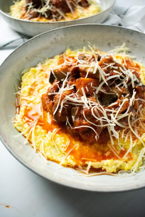 polenta and tomato sauce in a gray dish