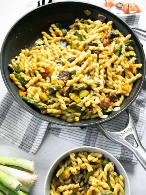 pasta and vegetables in a skillet